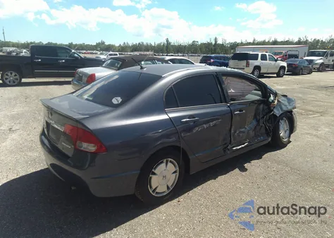 2009 Honda Civic Hybrid from USA, damaged, VIN JHMFA362X9S013436